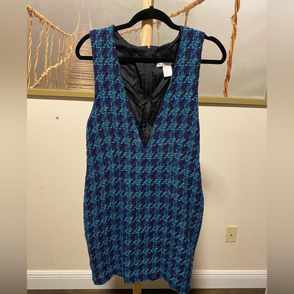 The limited wool blend v-cut dress